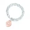 Return to Tiffany® 系列 Heart Tag 纯银和 Rubedo® 金属中号手链  GRP06367