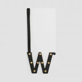 博百利/Burberry W 字母铆钉皮革吊饰 (黑色 / 浅金色) - 女士  80235401